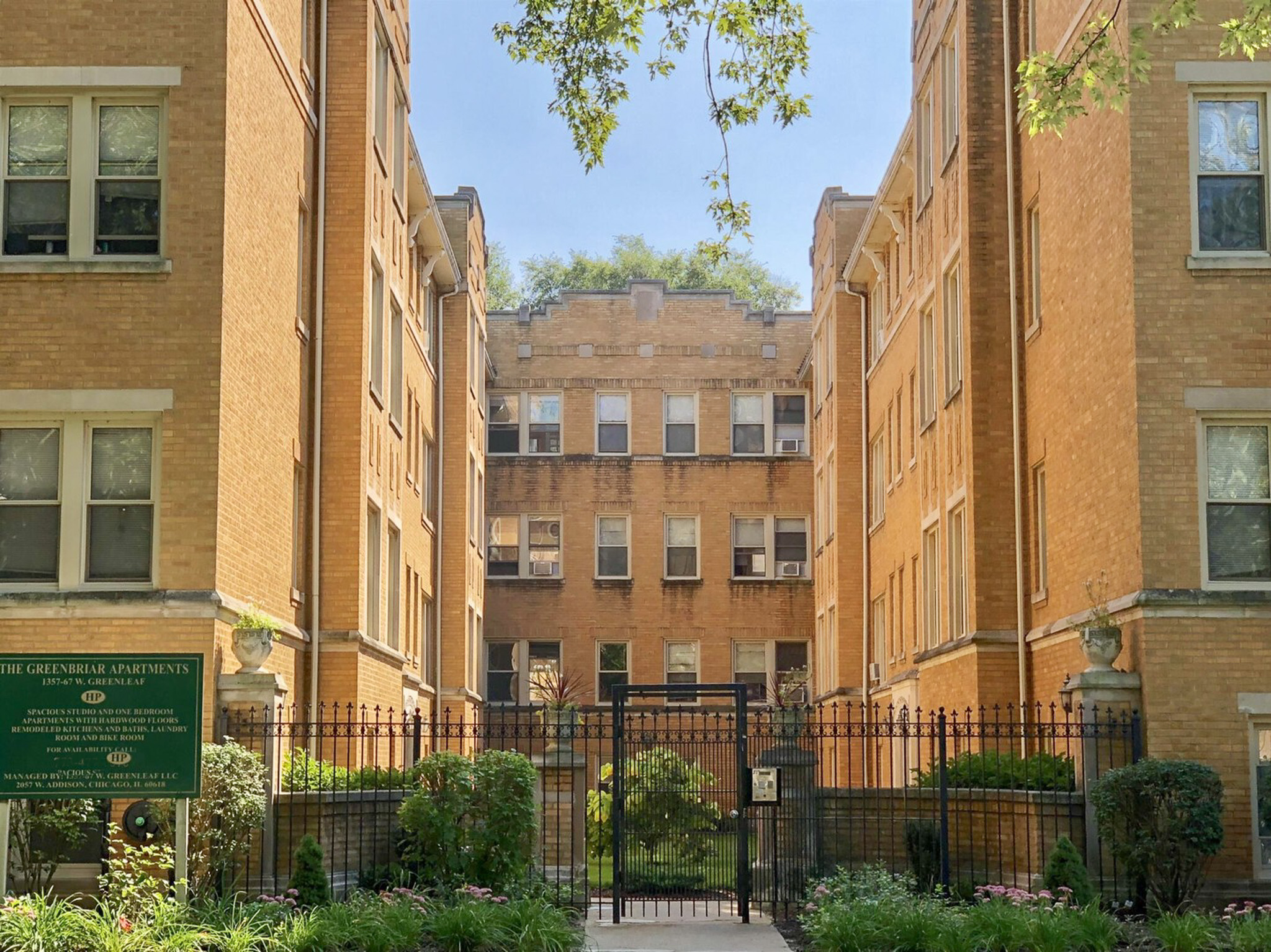 Buff-Brick Vintage Courtyard Multifamily Community in Rogers Park Managed by Hunter Properties