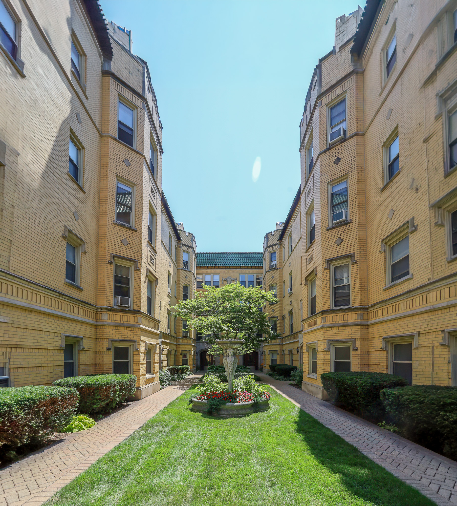 Chicago Vintage Courtyard Multifamily Complex with Fountain Managed by Hunter Properties